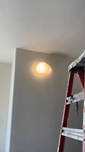 Wall sconce in a stairwell