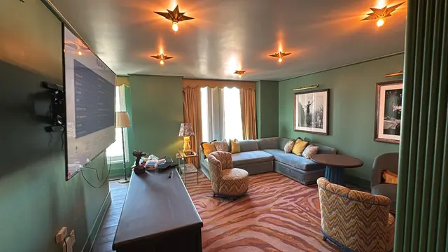 Star ceiling lights in a green living room