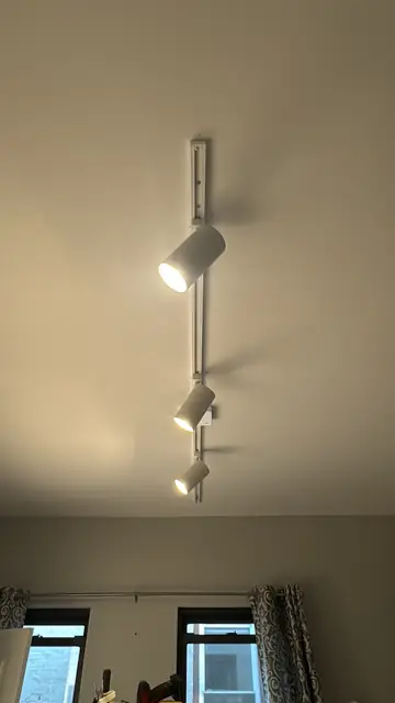 Track lighting in a bedroom