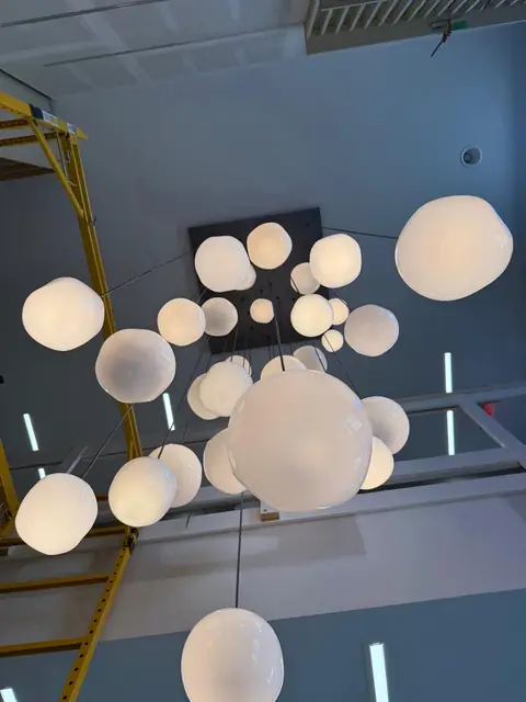 Globe pendants from below, atrium install